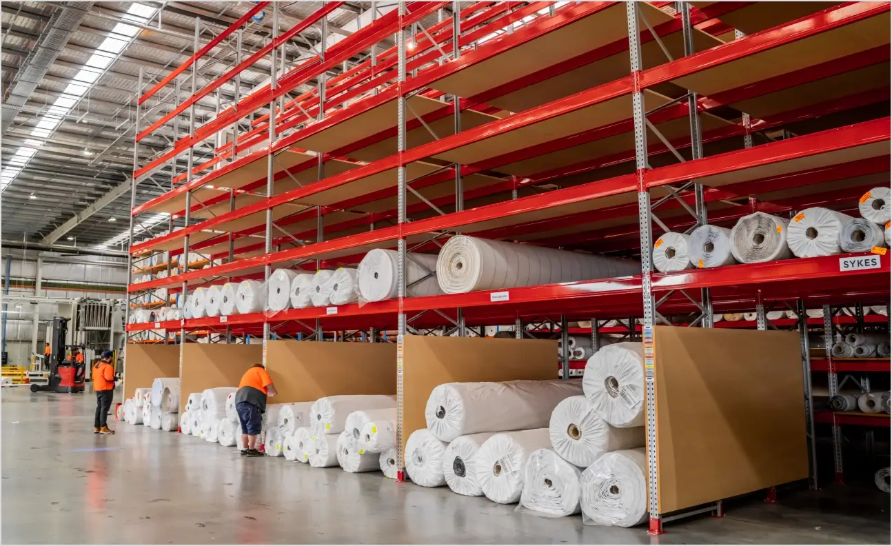 Double deep pallet racking system for high-density warehouse storage of bulk rolled materials